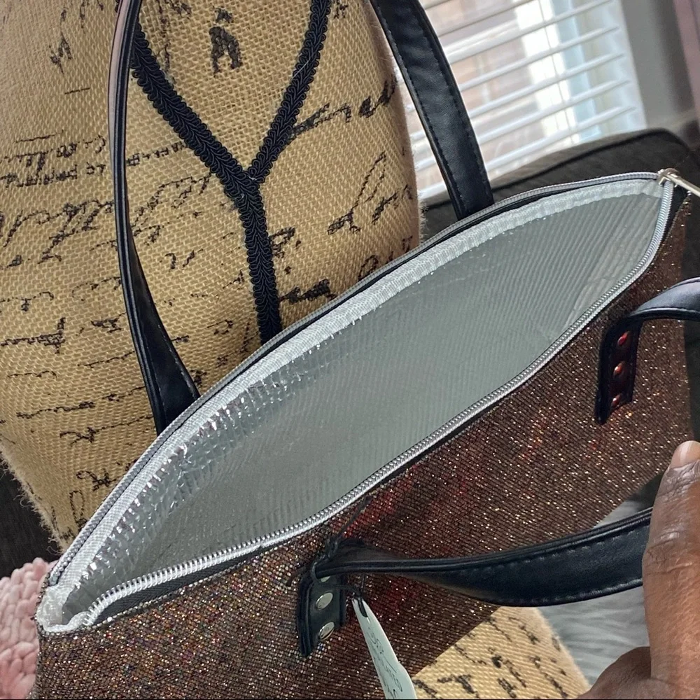 Insulated wine carrier hand bag.  Has a beautiful glitter finish to it.